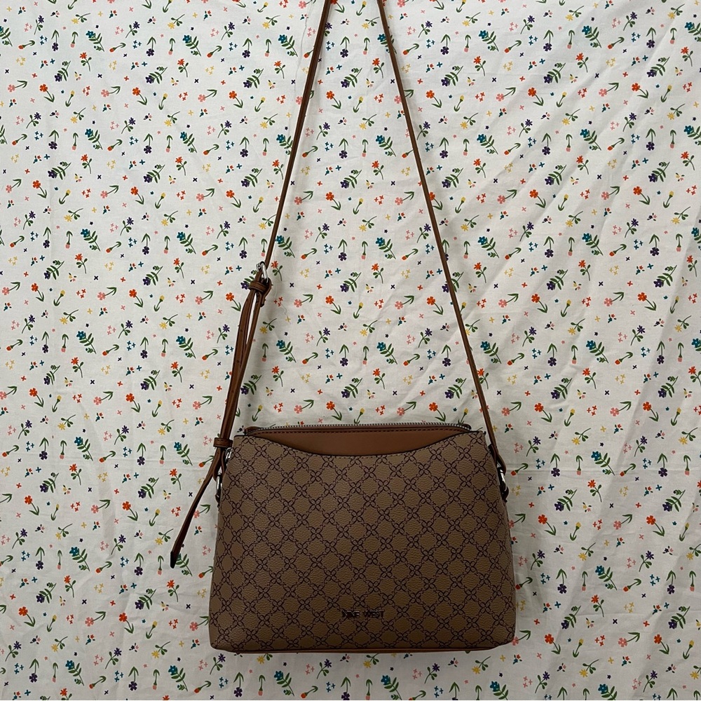 Brown tan crossbody purse from the brand Nine West.